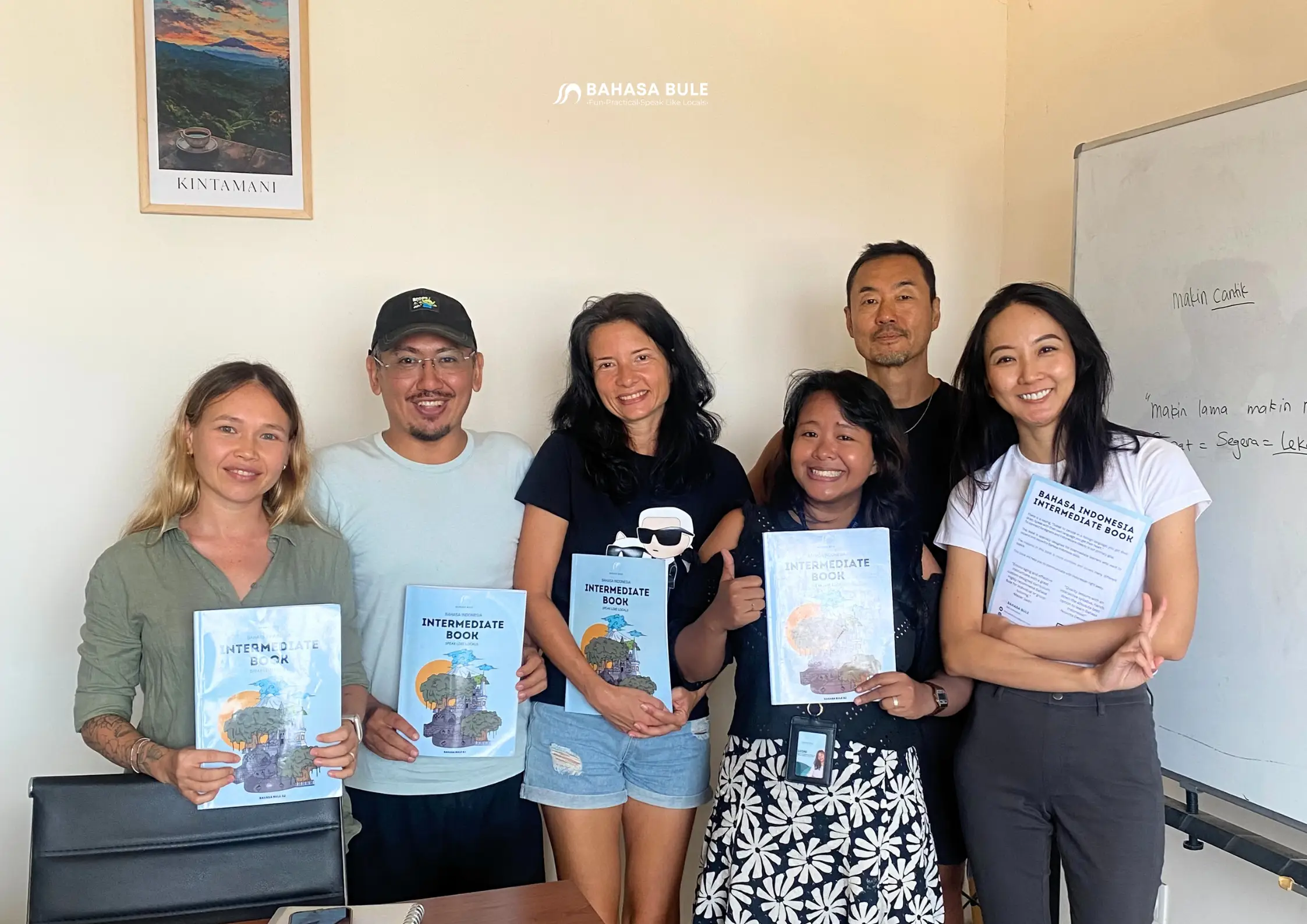 Bahasa Bule students receiving their Indonesian course certificates in Bali